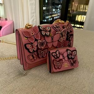 Never used Coach butterfly bag and matching wallet.